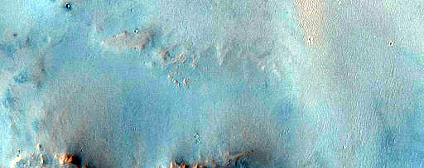 Phyllosilicate-Rich Crater Ejecta in Syrtis Major