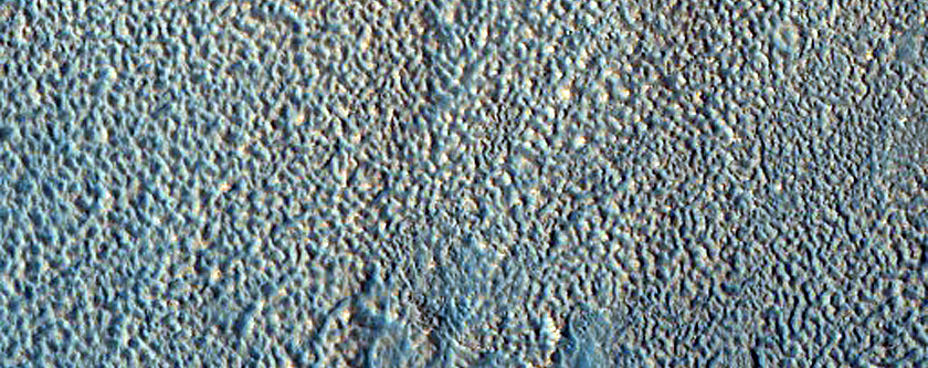 Layers and Terraces in Interior of Apt Crater