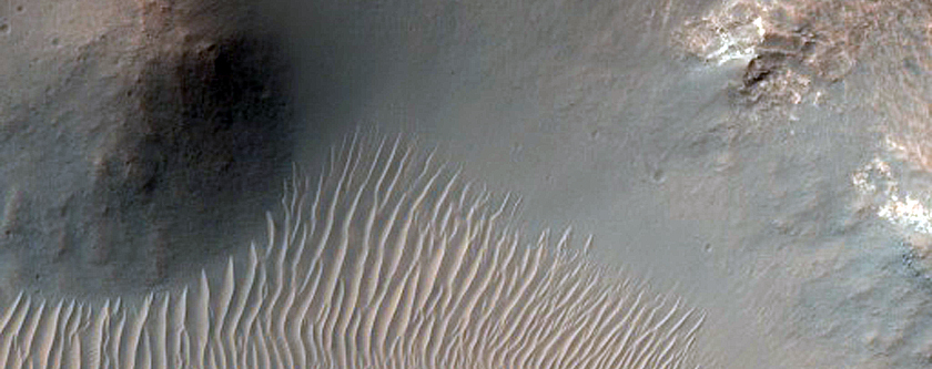 Exposures of Layered Bedrock North of Hellas Planitia