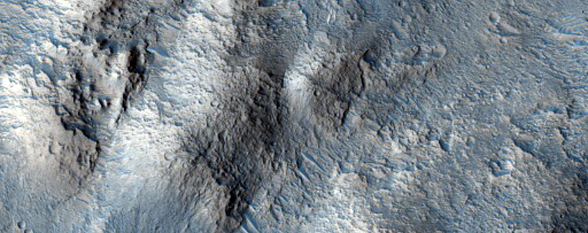 10-Kilometer Crater with Central Pitted Peak