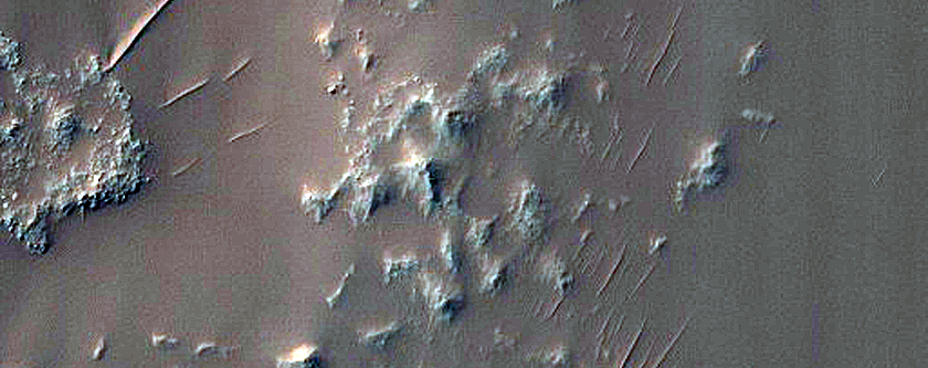 Channels and Features near Deepest Point of Holden Crater
