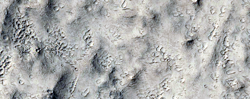Ejecta Moving Into Northern Mid-Latitude Crater