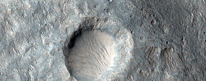 Cone-Shaped Form Crosscut by Trough in Lederberg Crater