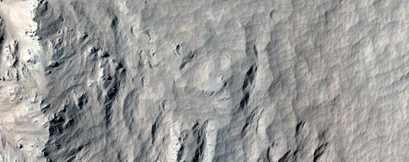 Monitor Steep Slopes of Recent Crater