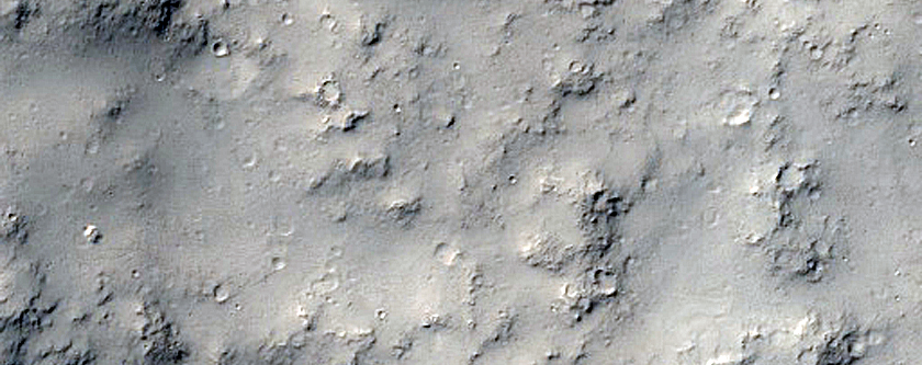 Channel Entering Crater near Apollinaris Sulci