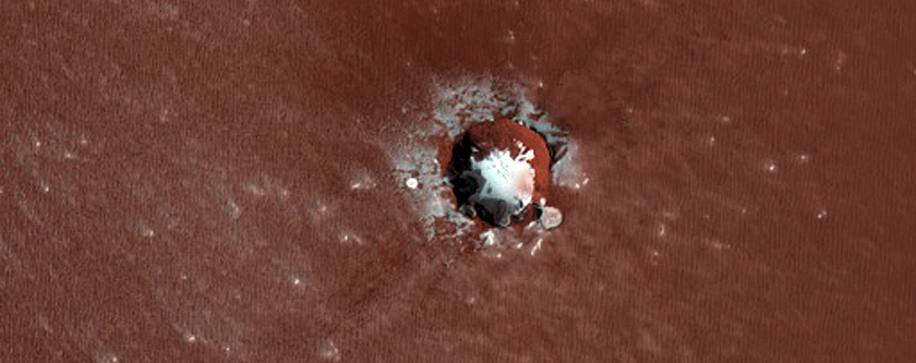 Small Ice-Filled Crater on North Polar Layered Deposits