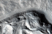 Nilosyrtis Region Crater with Asymmetric Walls