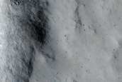 Pasted-on Material on Crater Ejecta