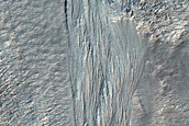 Small Channels on Equator-Facing Slope