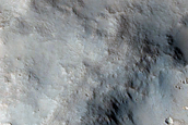 Channel and Crater in Tyrrhena Terra