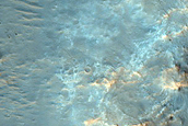 Channels Cutting Crater Rim in Tyrrhena Terra
