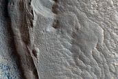 Dipping Layers in Crater in Deuteronilus Mensae