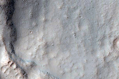 Crater with Steep Slopes in Terra Sirenum