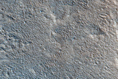 Layered Structure in Crater in Tempe Terra