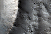 Channel and Crater Ejecta in Northwest Alba Patera