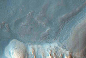 Crater on Floor of 35-Kilometer Diameter Crater East of Thaumasia Planum