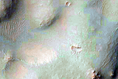 High-Albedo Material in Samara Valles Crater