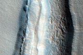 Dipping Layers Outside Large Crater Rim in Northern Mid-Latitudes