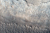 Ejecta on Icy Crater Fill