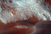 Layered Terrain on Floor of Orson Welles Crater