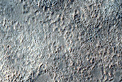 Small Channel within Larger Valley in Hellas Region