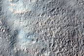 Channel near Crater Ejecta in Southern Mid-Latitudes