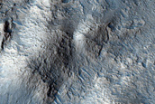 10-Kilometer Crater with Central Pitted Peak
