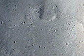 Impact Crater adjacent to Ravine