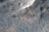 Crater South of Capri Chasma near Phyllosilicate-Rich Terrain