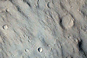 Boulder-Shedding Layers in Isidis Planitia