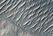 Layered Positive Relief in Association with Osuga Valles Depression