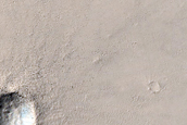 Fresh Impact Crater with Dark Ejecta Pattern near Schroeter Crater