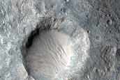 Cone-Shaped Form Crosscut by Trough in Lederberg Crater