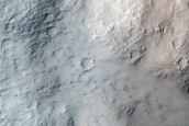 Impact-Related Flow Features in Amenthes Planum