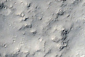 Channel Entering Crater near Apollinaris Sulci