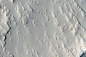 Mare-Type Ridge Intersected by Crater in Intercrater Terrain