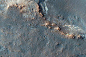Mawrth Vallis Dark-Toned Cap Associated with Well-Preserved Crater Ejecta 