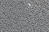 Small Ice-Filled North Polar Layered Deposits Crater