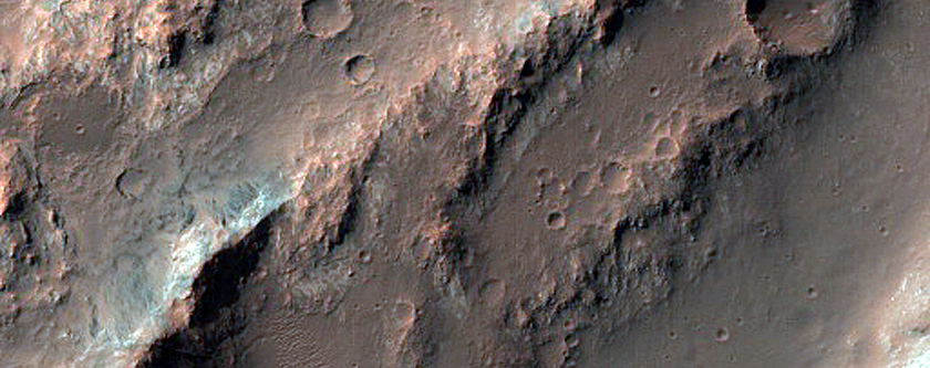 Bench Morphology and Olivine-Rich Terrain in Eos Chasma