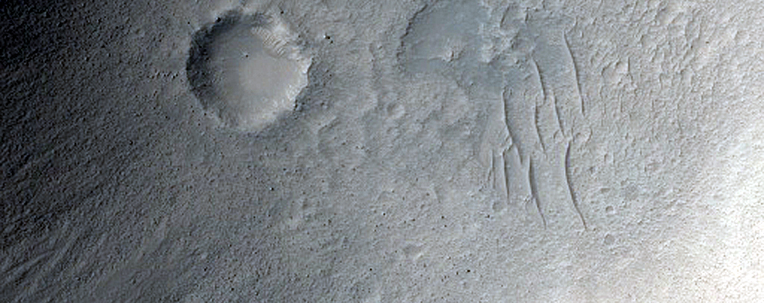 Deflated Rampart Crater near Hephaestus Fossae