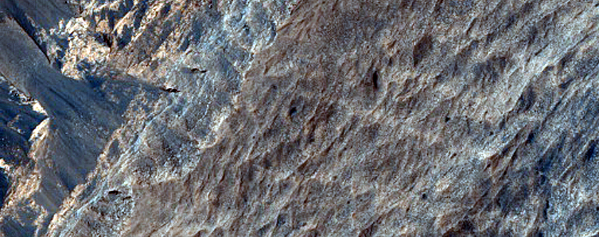 Steep Layered Deposits in Coprates Chasma