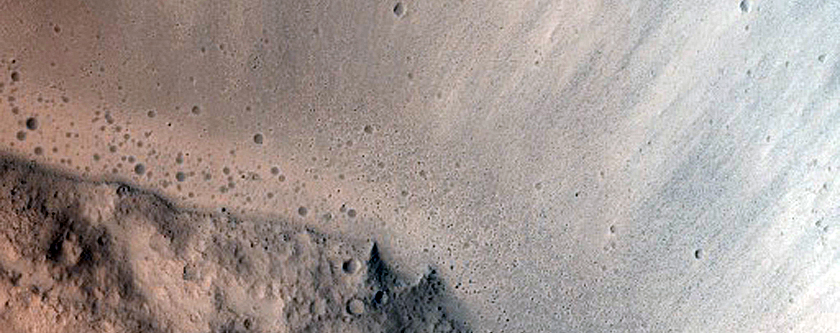 Small Crater Exposed via Erosion