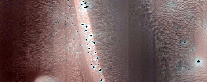 Dunes with Sliding Ice Blocks