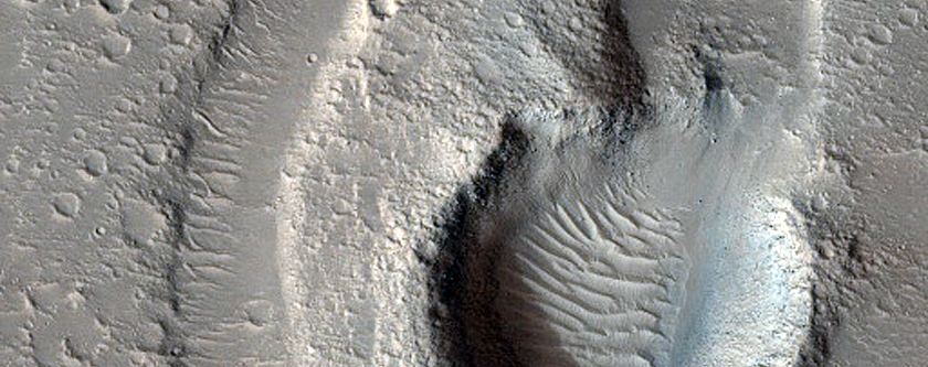 Flooded Impact Crater in Hebrus Valles