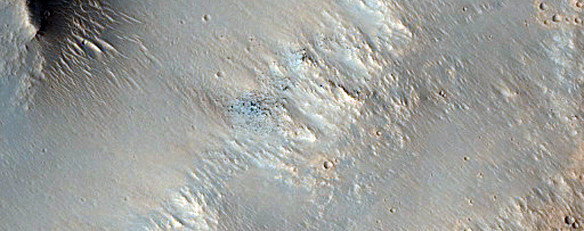 Fresh Cratering Covering Crater Rim