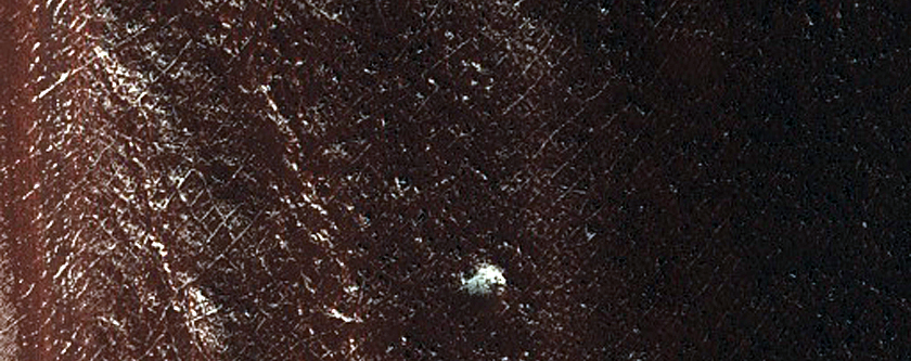 Eroding Deposit on Floor of Crater South of Hellas Planitia