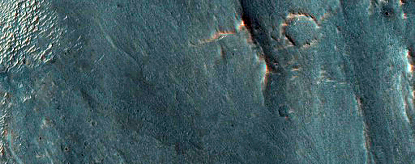 Layers and Sinuous Ridges in Crater