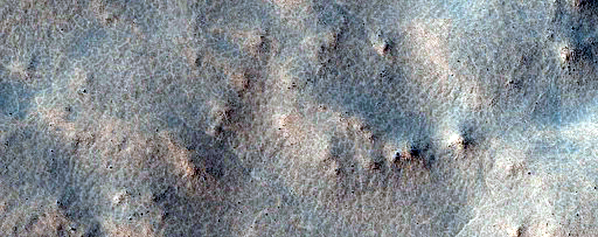 Armored Ejecta Deposits with Mafic Signature
