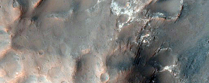 Central Peak Pit of 16-Kilometer Diameter Crater in Terra Cimmeria