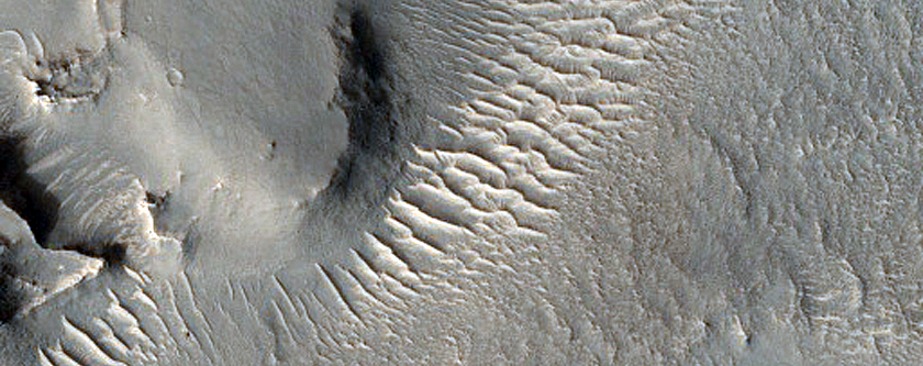 Layers in Crater Depression near Auqakuh Vallis